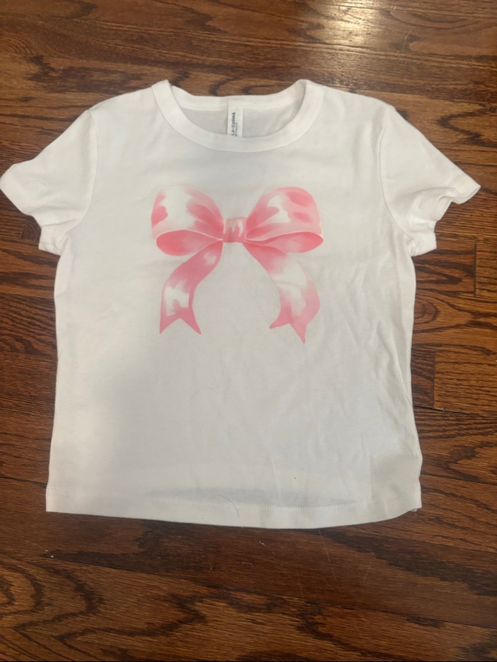 Bella Canvas Women’s White Tee With Pink Bow Graphic Size Small